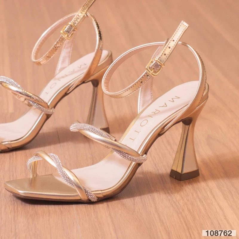 Sandália salto flare ampulheta, duas tiras entrelaçadas com strass, dourada